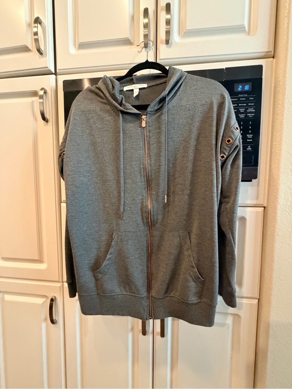 Grey Zip-Up Hoodie with Hood and Grommet Sleeve Detail